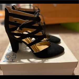 Used black size 12 women’s caged heel